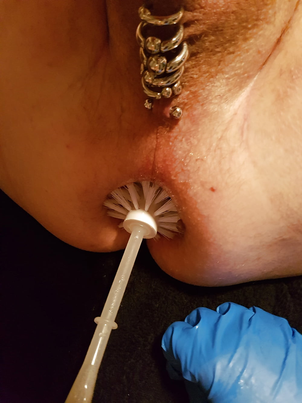 Anal with brush