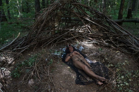 in forest cradle with apple         