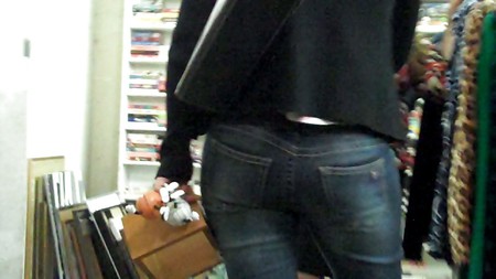 Following her ass and butt in jeans