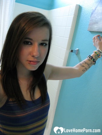 passionate teen moans while playing with herself         