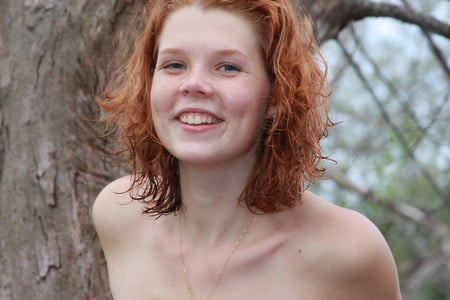 23 Seductive Pics of Gorgeous freckled redhead Tori posing nude in the beach thumbnail