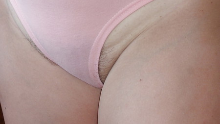 Hairy cunt my wife is visible from under pink panties
