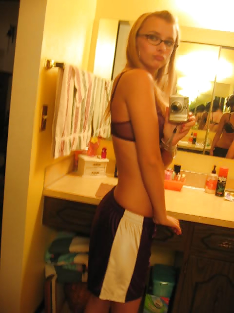 XXX Geeky blonde strips down