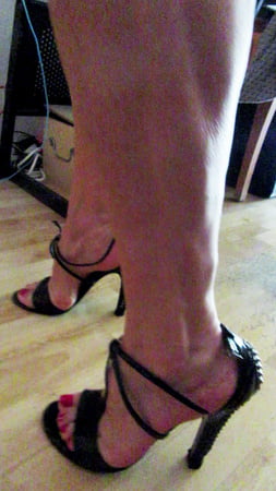 luminous contours of legs heels and ass         