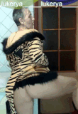 lukerya in small black panties with a long tiger tail         