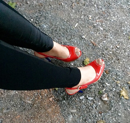 new red high heels and feets