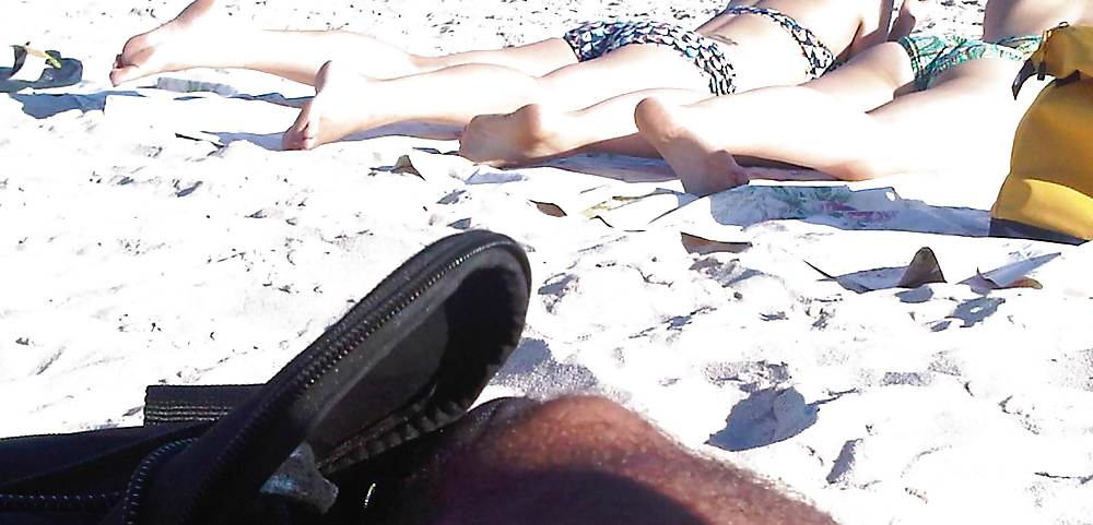 XXX asians laying on the beach