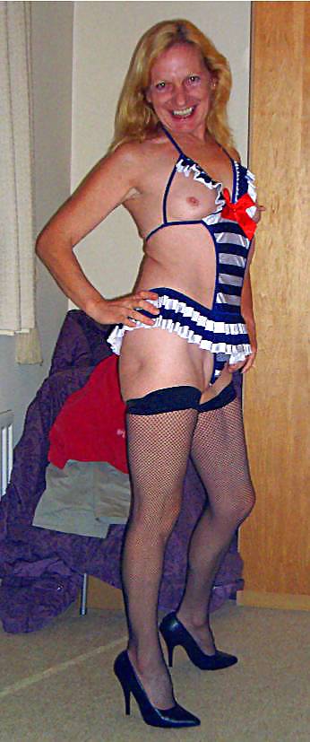 XXX Sexy mature lady as sailor