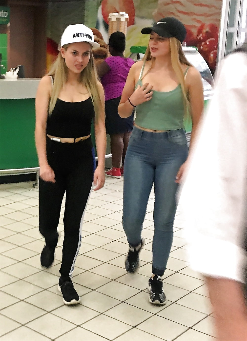XXX 2 mall teens showing off their big tits and asses