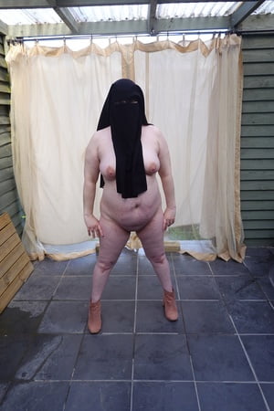 nude in niqab in ankle boots         