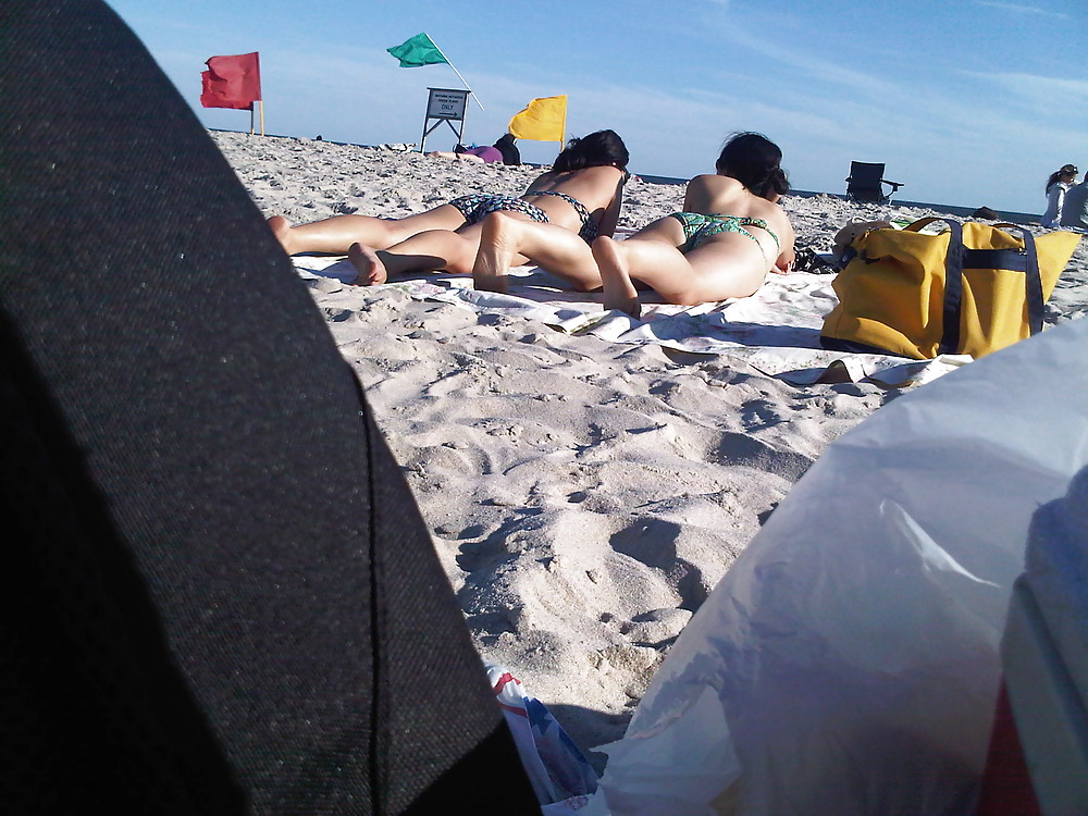 XXX asians laying on the beach