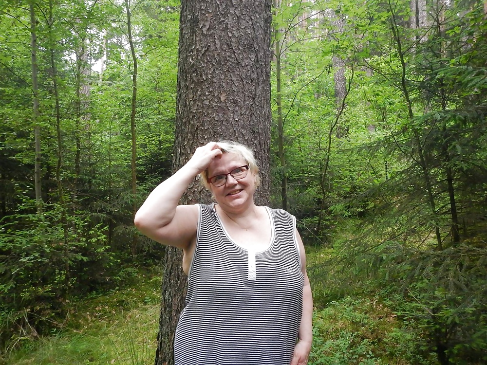 XXX Busty granny in forest