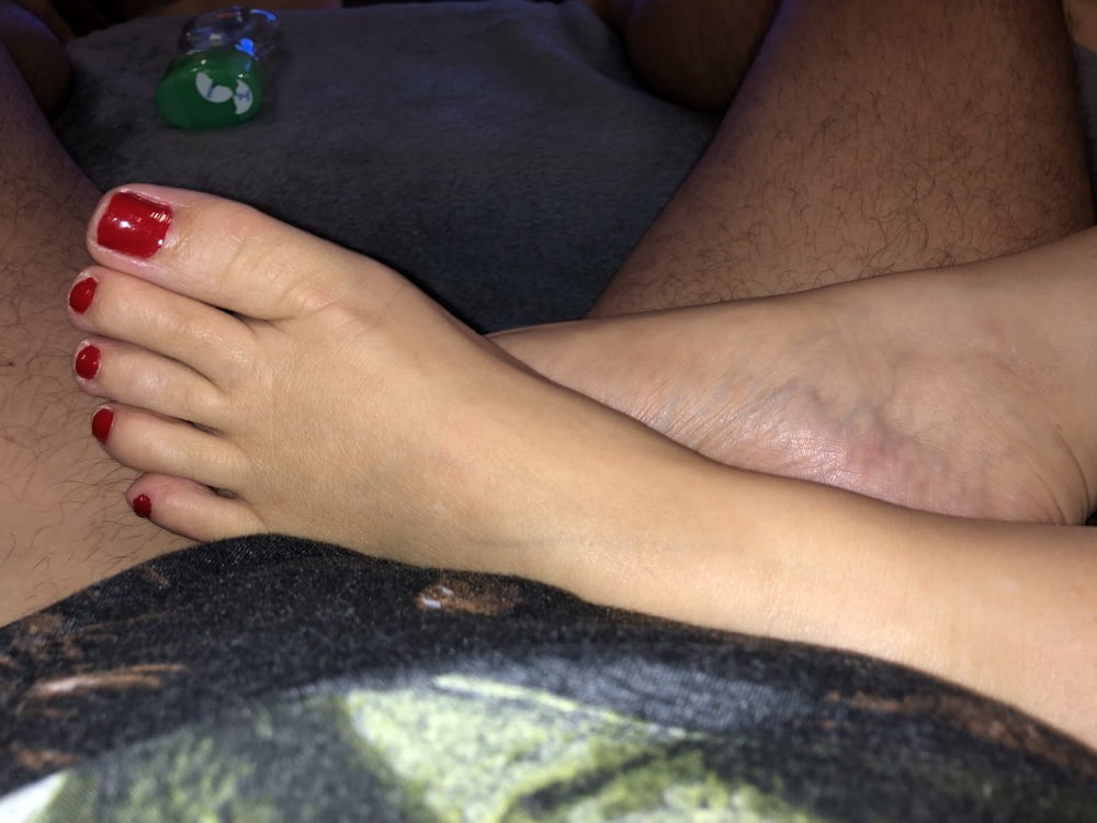 Red toes footjob