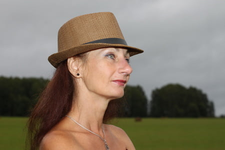 rainy day in meadow and woman         