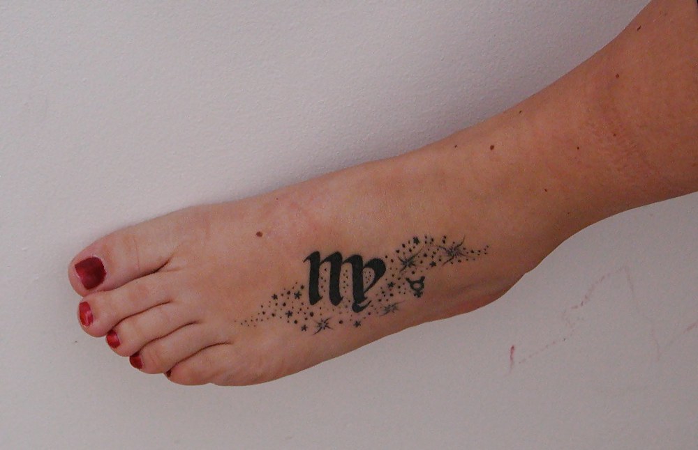 XXX feet tatoo