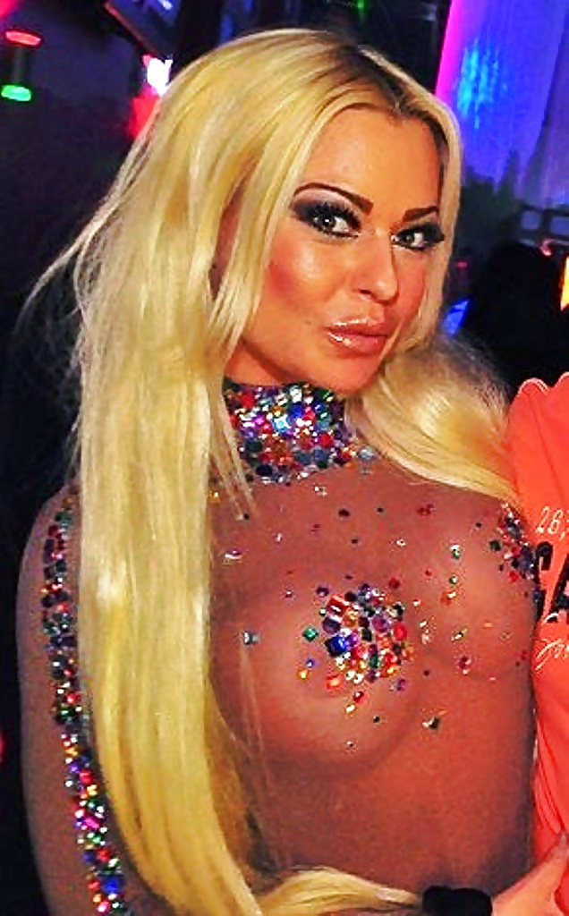 XXX German blonde disco bitch with a transparent upper part