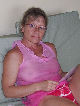 Sexy mature in hotel room