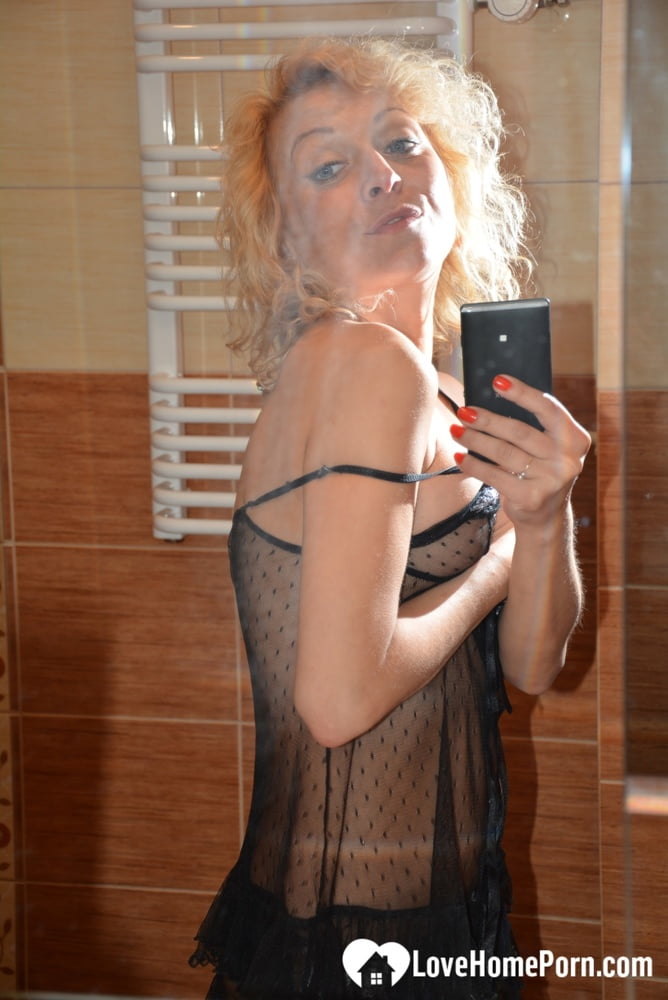 Hungarian sweetie teasing in her black lingerie  