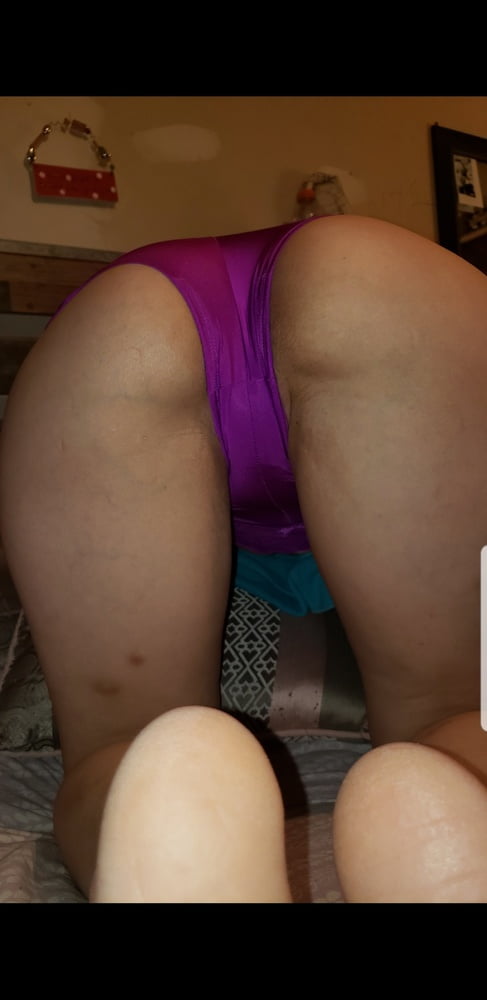 My wife bent over showing her sexy panties - 4 Photos 
