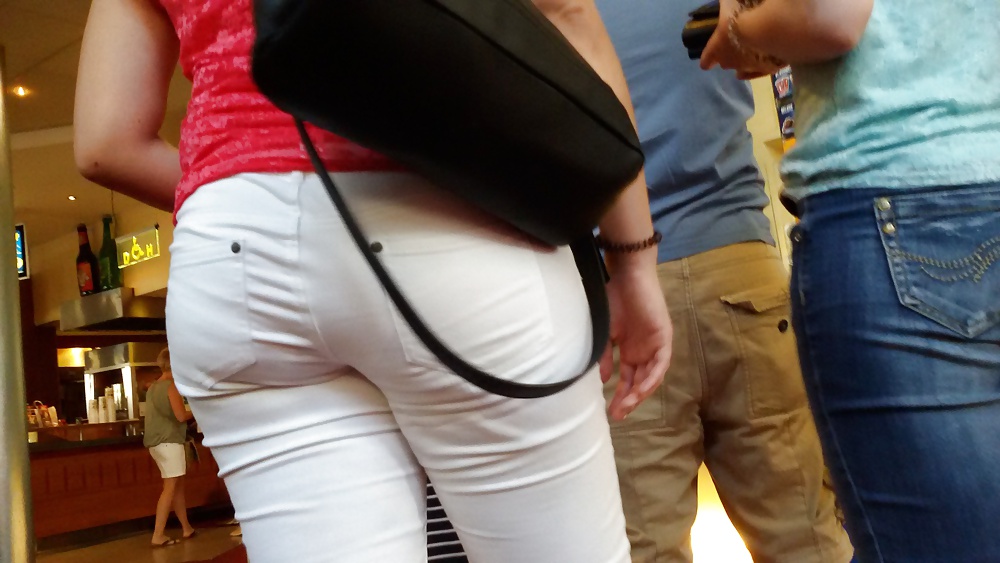 XXX voyeur hidden cam white jeans ass in the streets store