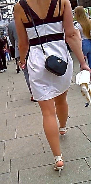 Hot blonde walking the streets inpantyhose and heels - 52 Photos 
