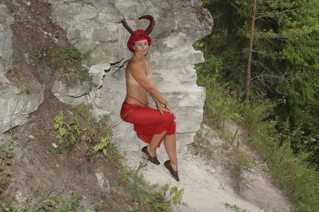forest satyr on the rock         