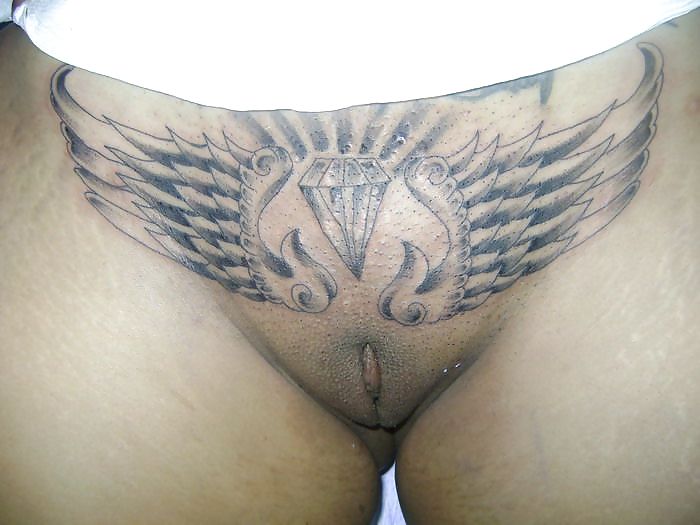 XXX woman tatoo