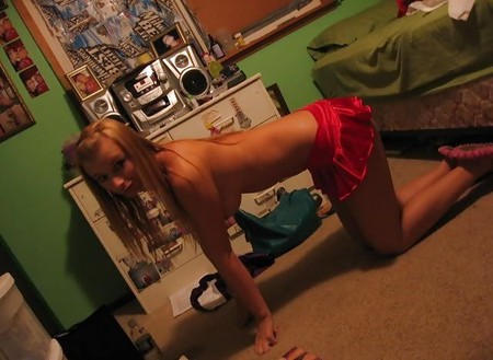 Geeky blonde strips down