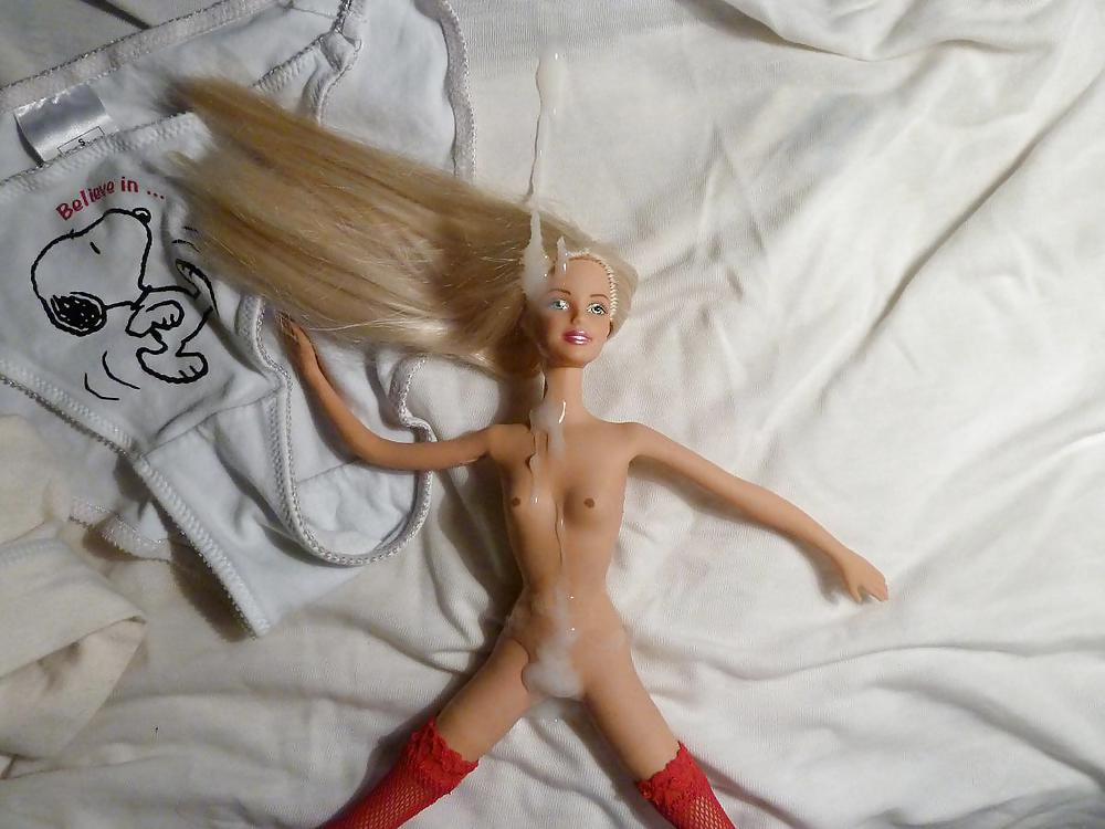 Cumshot on a Barbie doll.