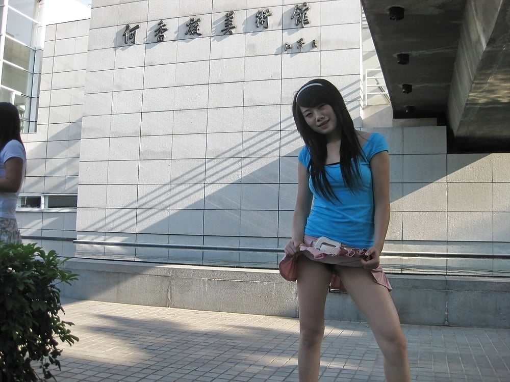 XXX Chinese girl flashing pussy in public