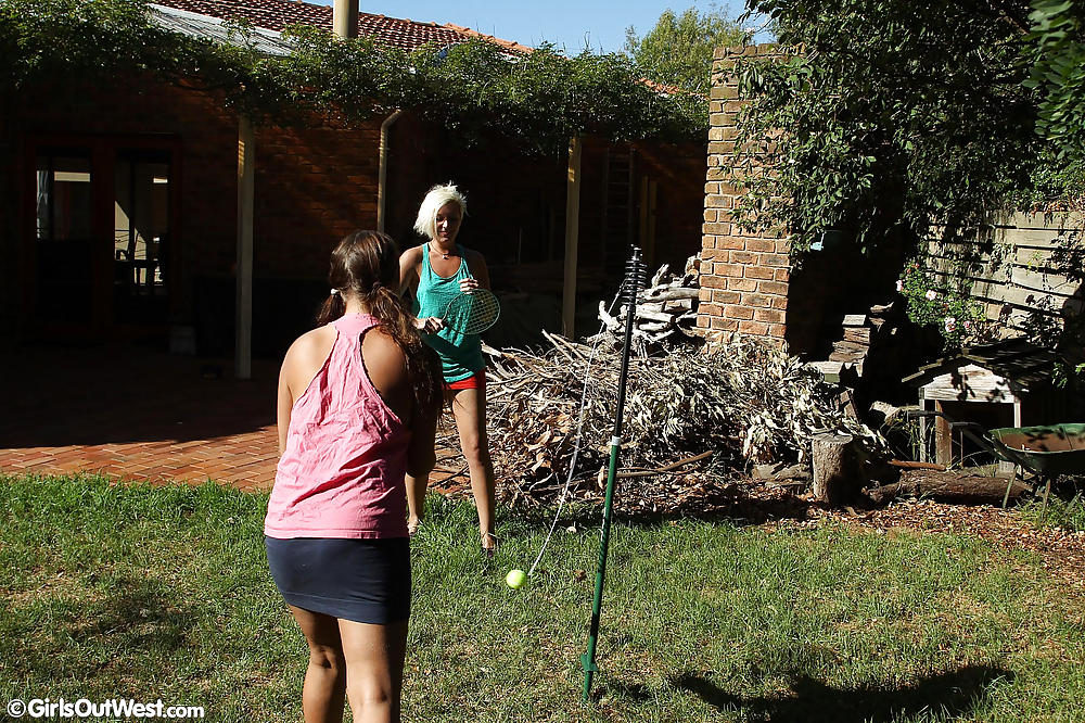 XXX Aussie lesbians spreading pussies in the backyard