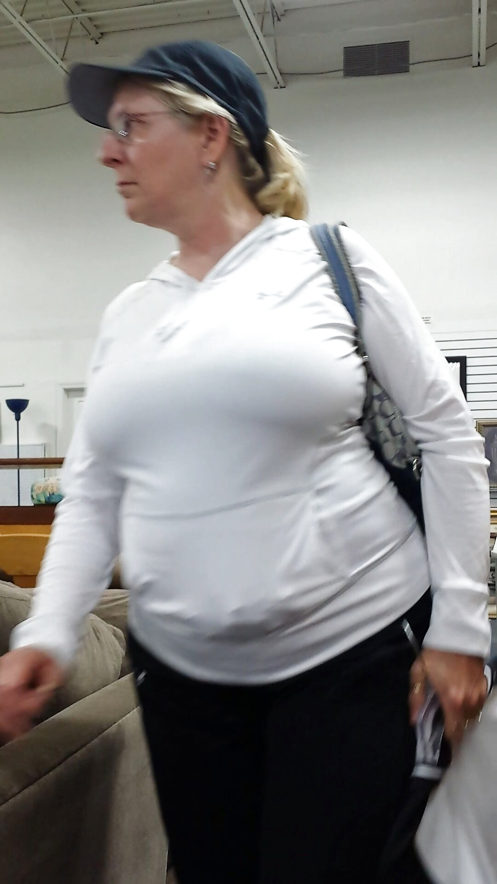Candid mature big boobs shopping in tight top - 4 Pics ...