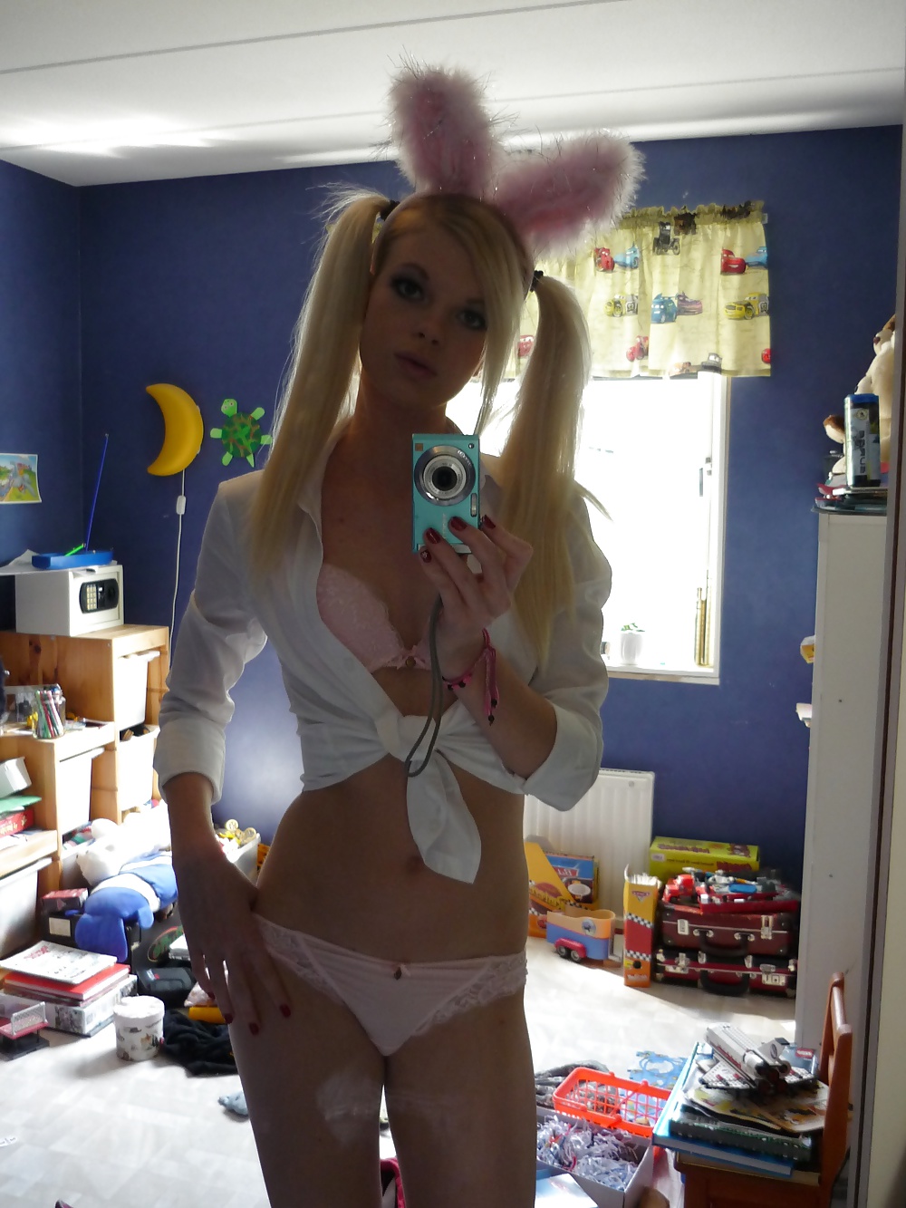 XXX Blonde skinny teen taking selfies