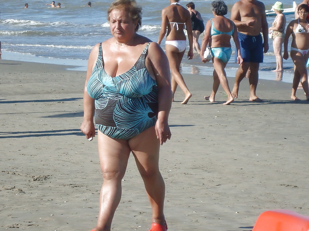 XXX Busty granny on the beach! Mixed!
