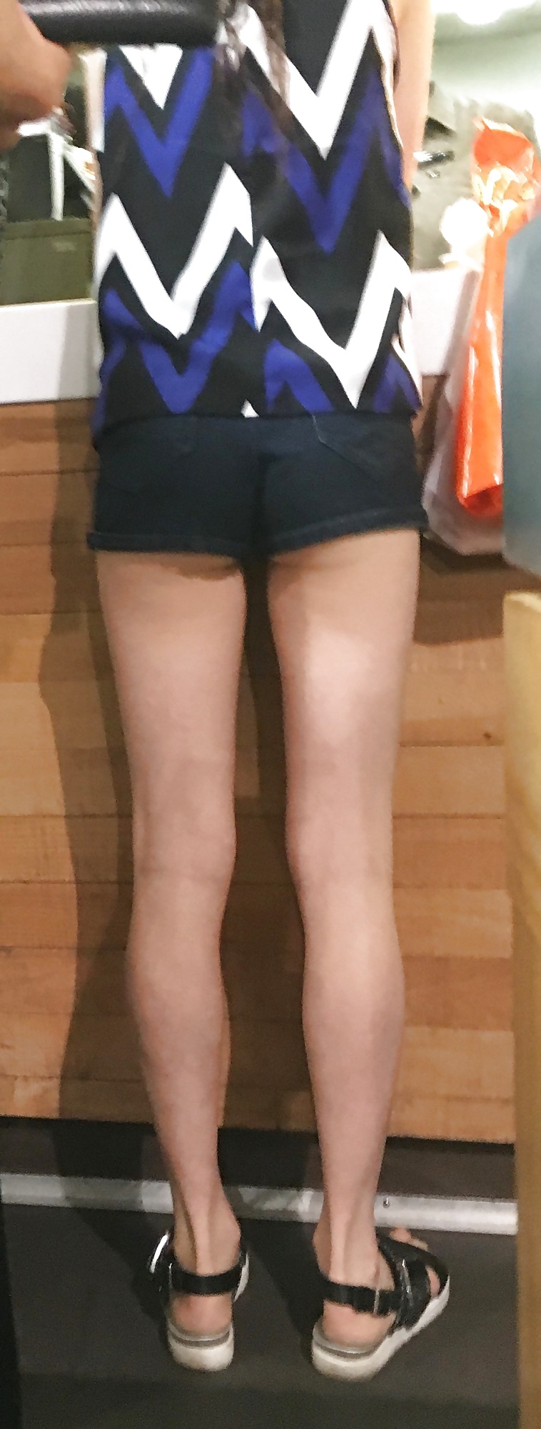 XXX Tiny redhead mall teen in tiny shorts with a tiny ass