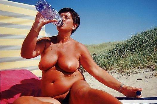 Naked women sunbathing