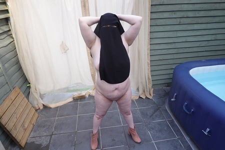 nude in niqab in ankle boots         