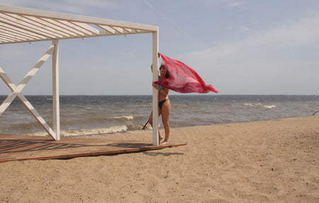 red shawl on windy weather         