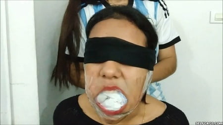 gagged with    socks and clear tape gag selfgags         