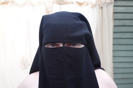 nude in niqab in ankle boots         