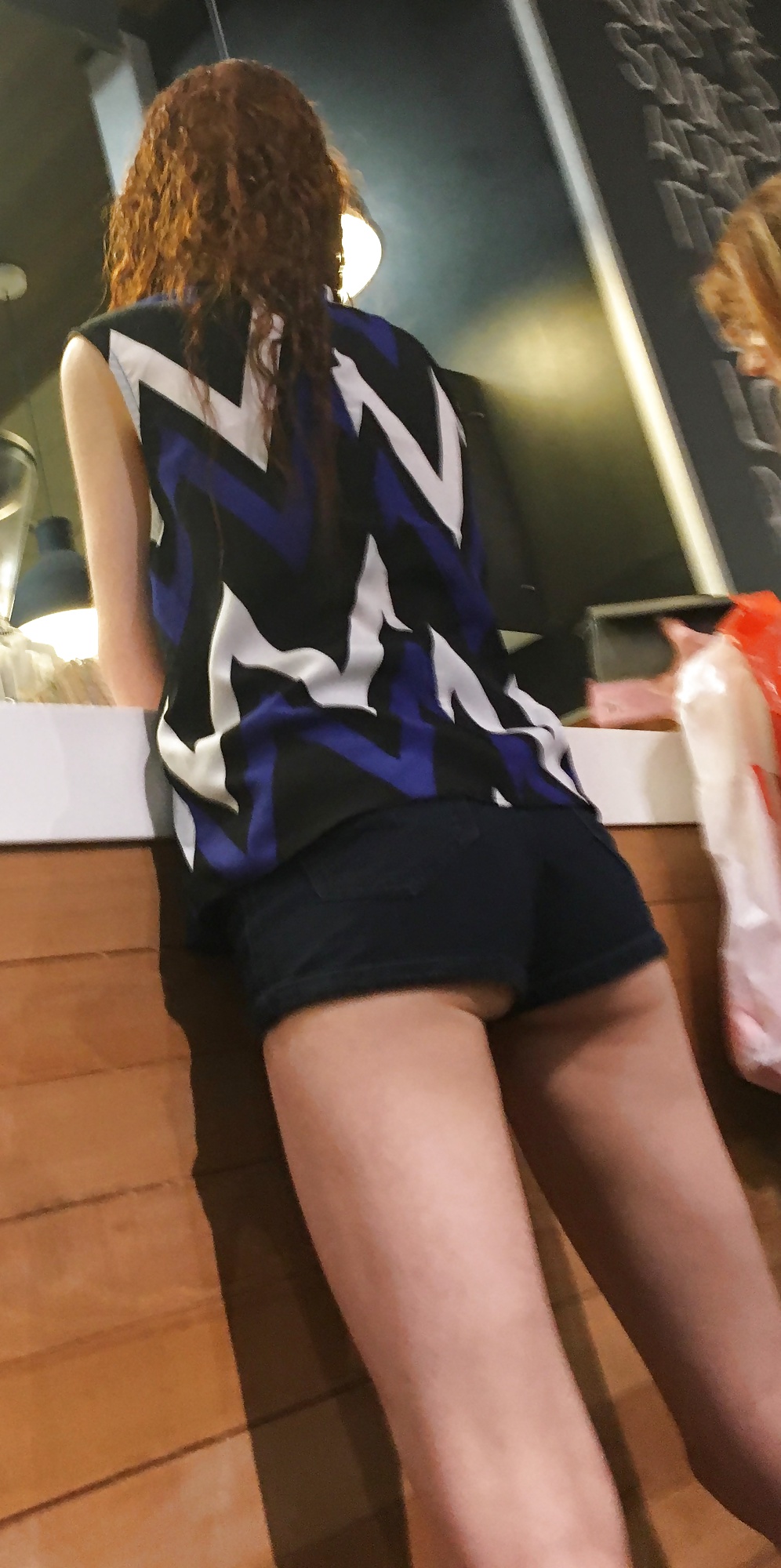 XXX Tiny redhead mall teen in tiny shorts with a tiny ass