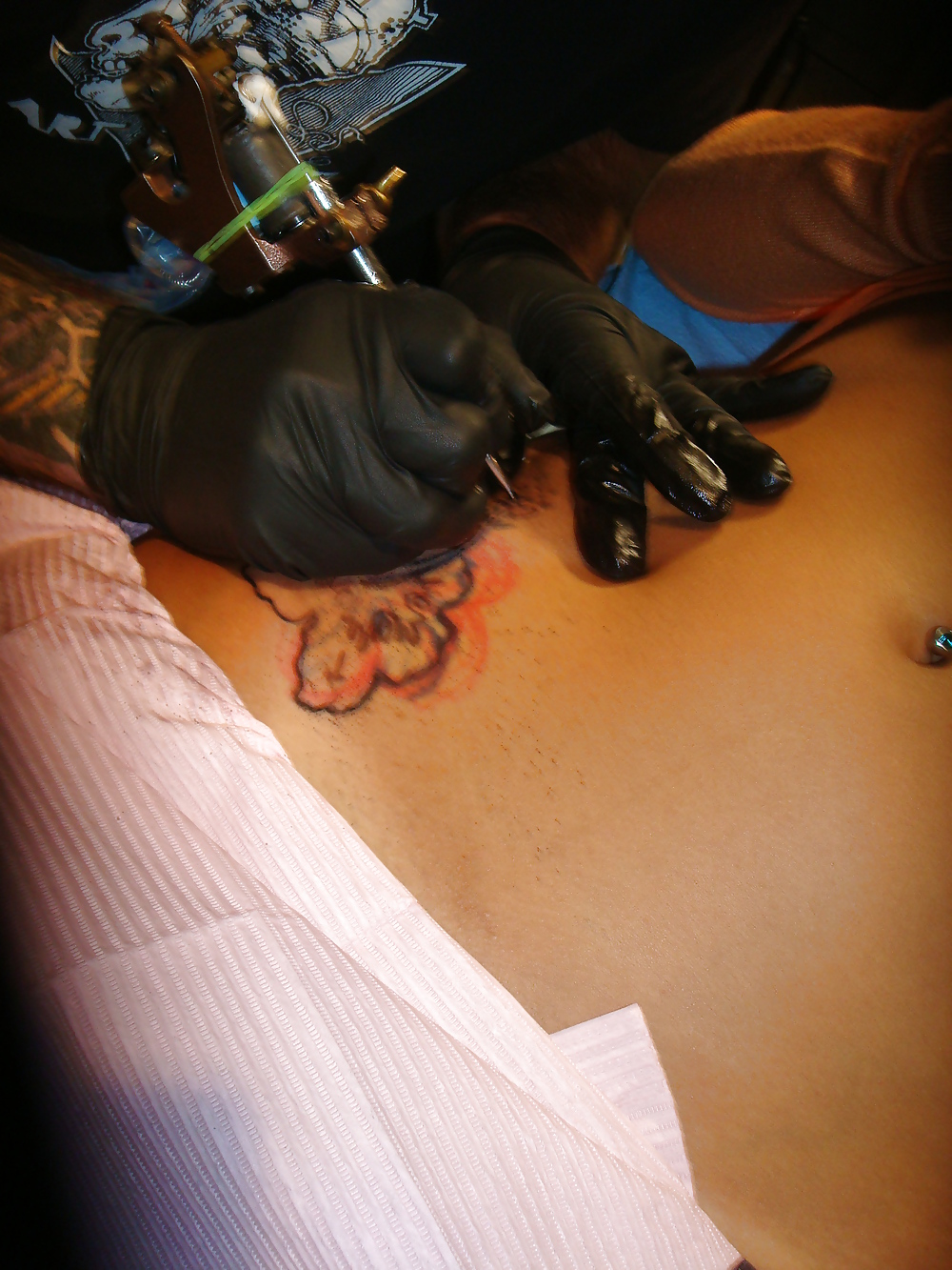 XXX Girl getting tattooed and fucked