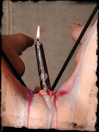 Anna being a BDSM candle stick