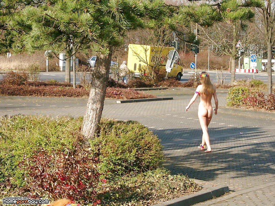 XXX Posing naked in a public place